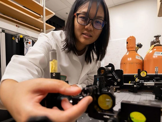 woman wearing glasses in laboratory